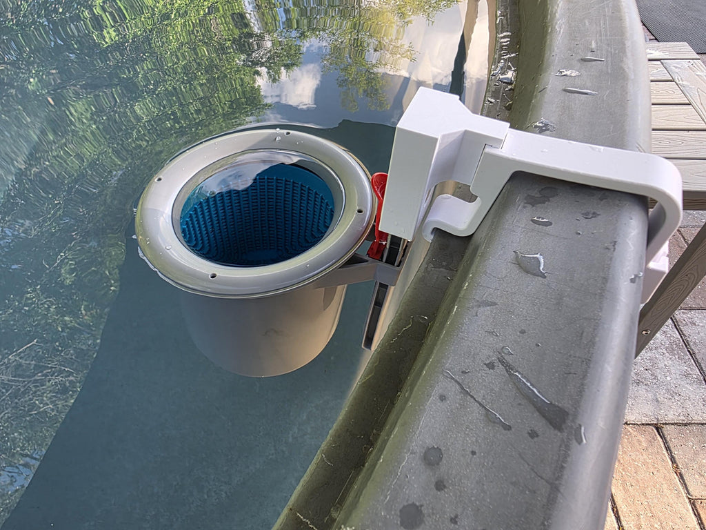 A US Pool Supply above ground pool skimmer installed onto a grey poly stock tank using a white 3D printed bracket and a white adapter to the US Pool Supply skimmer support rod. 
